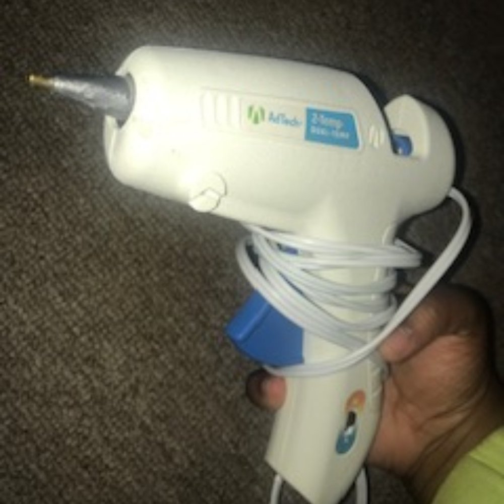 Hot glue gun ( hot glue sticks included )